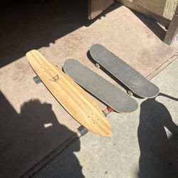 Slappys Garage Skate Boards and a Long Board 