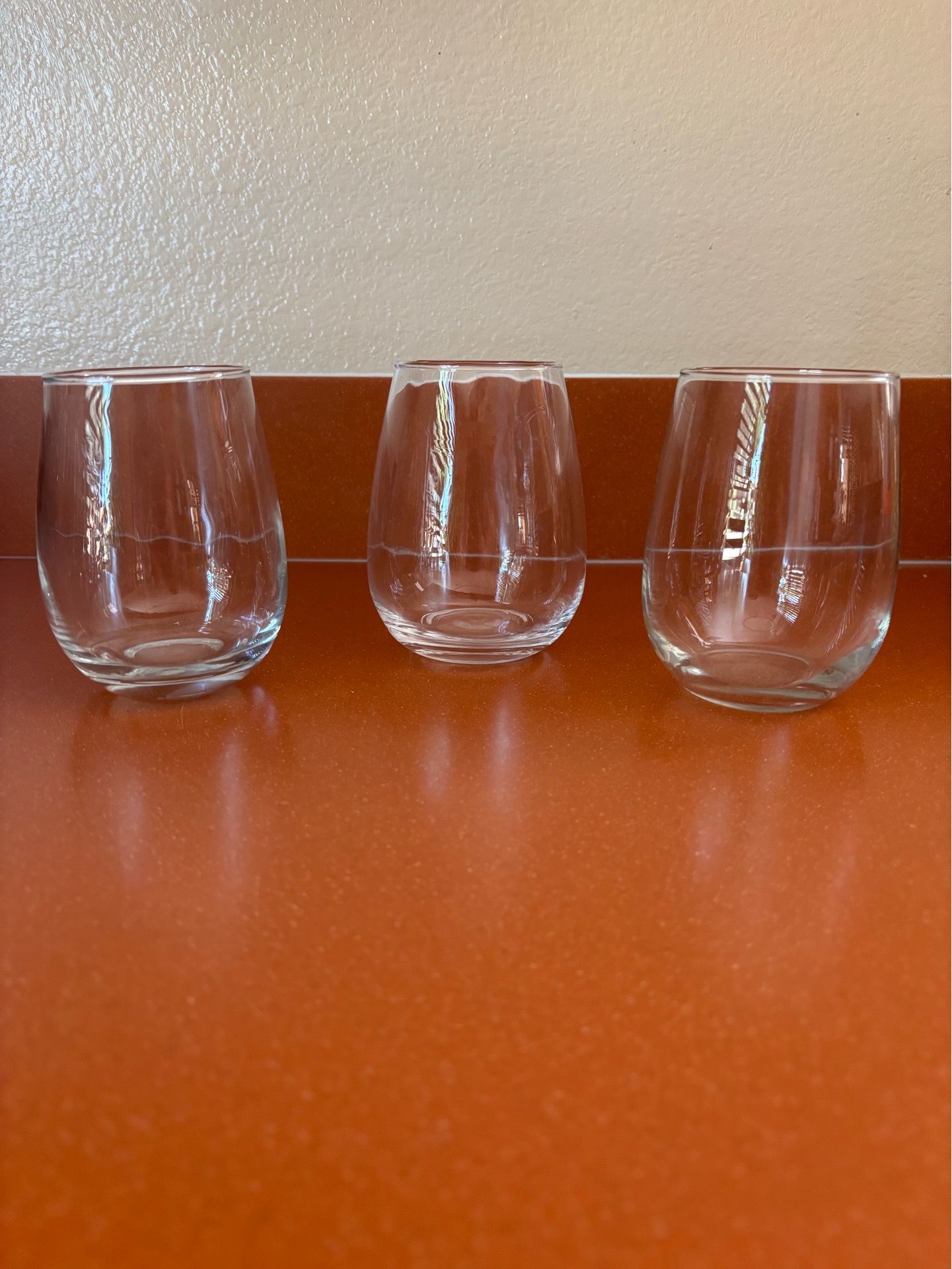 Three Stemless Wine Glasses