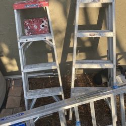 Lot Of Ladders 4- 22 Foot