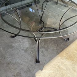 Glass coffee table with metal legs