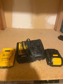 2 Dewalt batteries with a charger