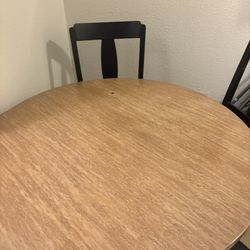 Round Dining Table With Four Chairs