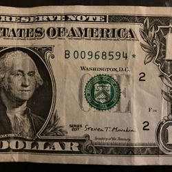 One dollar W/star & low serial number/00968594