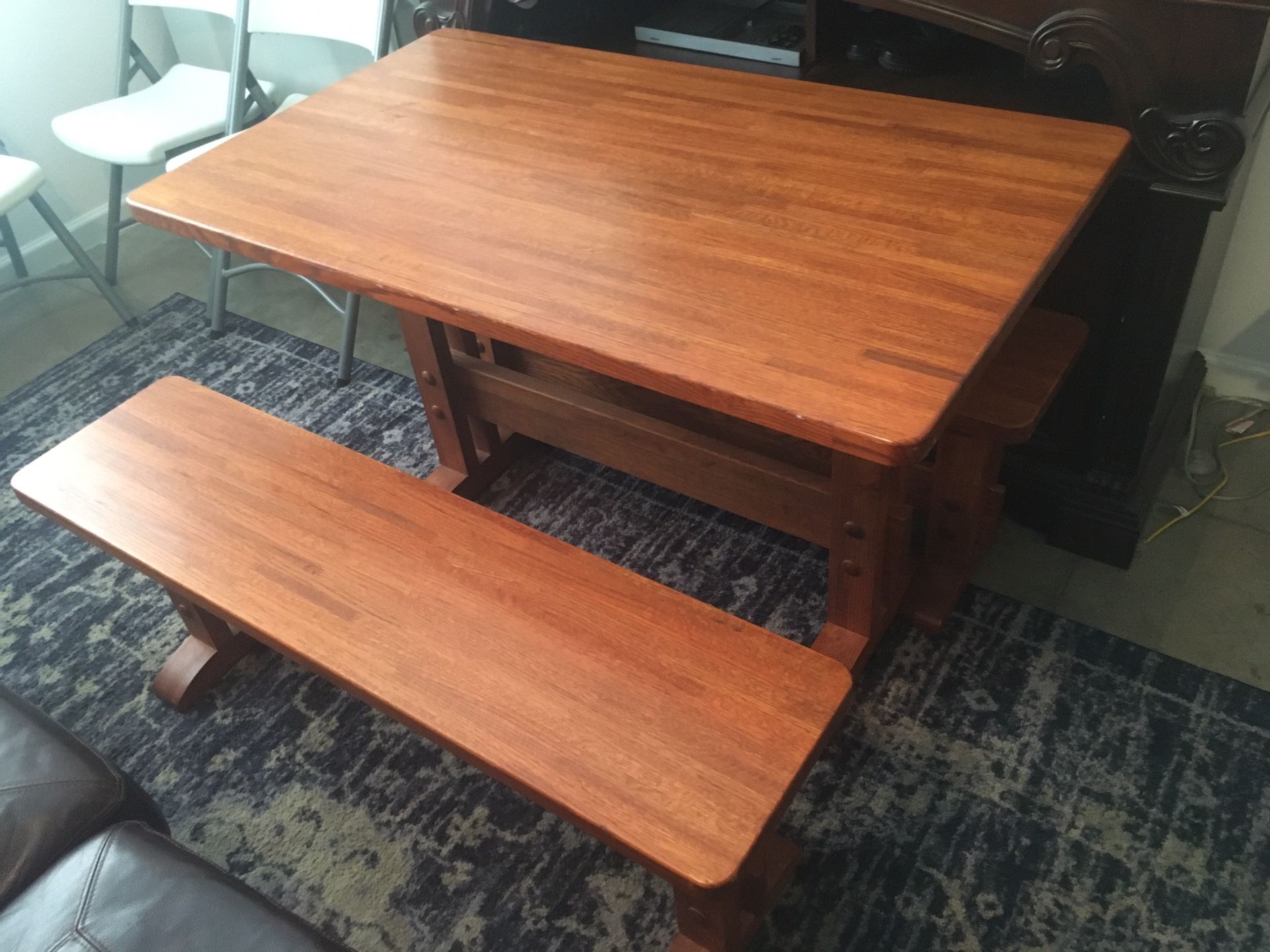 Medium size oak table, with two benches.