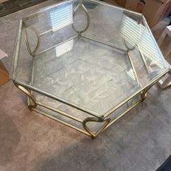 Glass And Brass Colored Coffee Table