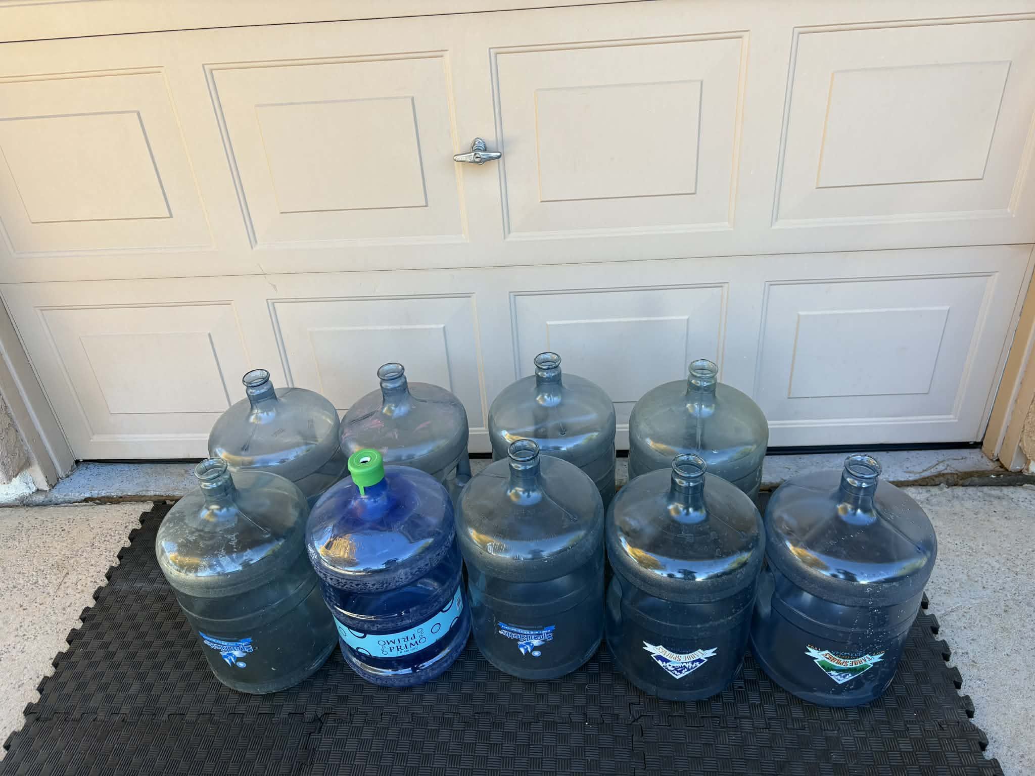 5-gallon reusable water jugs / 9 Bottles