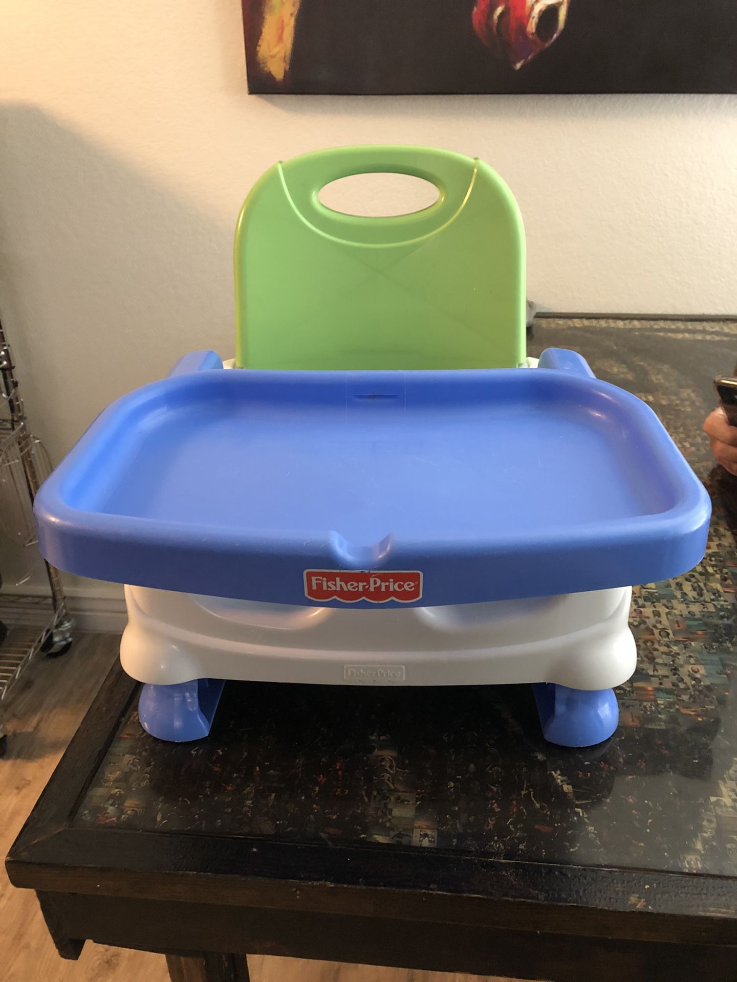 Fisher Price adjustable booster seat. In very good condition.