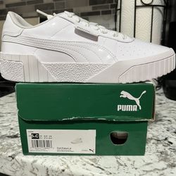 Puma ( California) Size 7 Patent Leather White