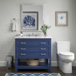Brand new 37” Everett vanity in Aegean Blue with Carrara marble top — never installed.