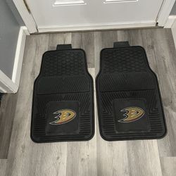 FANMATS NHL Anaheim Ducks 2pc All Weather Rubber Front Heavy Duty Floor Mats.  Preowned good condition.  Size approximately 26 inches long and 16 1/2 