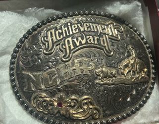 2 Sterling Gist brand buckle is a National Cutting Horse Association (NCHA) Achievement Award made with a sterling silver and 10k gold overlay