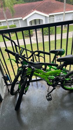 Two bikes and helmet