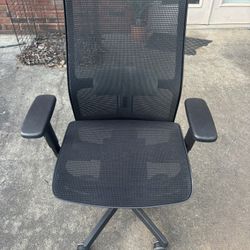 Ergonomic office chair, perfect for some with back problems.