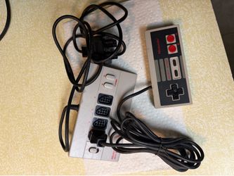 Nintendo controller and four score 4 player adapter bundle