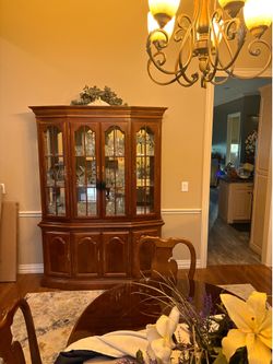 Dining room table with chairs and hutch