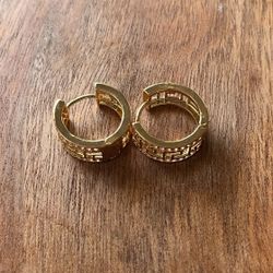 18K gold-plated hoop earrings with a Greek Key pattern and clear cubic zirconia