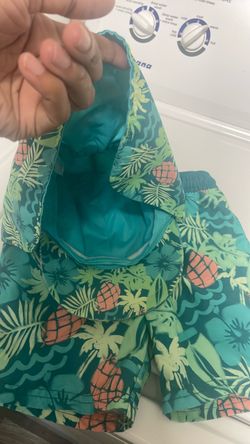 Boy swim trunks and hat