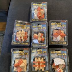 7 New Handheld Wood Assorted Puzzles 