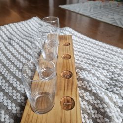 This is a 4-piece tumbler set by Adventure Out There. Each glass holds 9 oz and is dishwasher safe. Perfect for enjoying your favorite beverages!