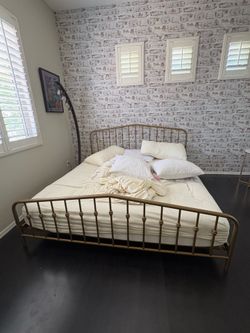Gold metal king size bed with mattress