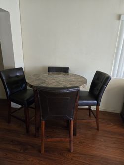 Pub height, faux marble table, 4 chairs