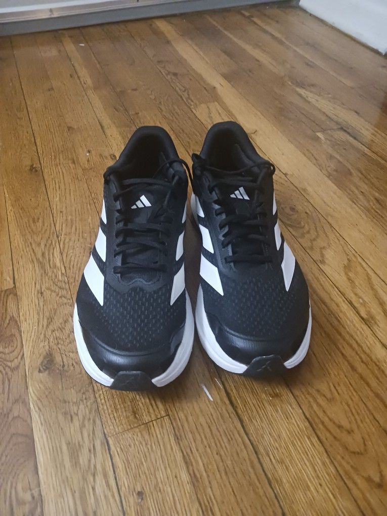 Running and walking shoes Adidas wide width size 12 (fit size 10.5 and 11 too ) used 2 times with insoles New never used .
Super light and comfor