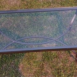 wrought iron base thick glass table glass has no chips brand new condition $100 or best offer