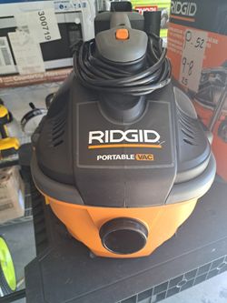 RIDGID
4 Gal. 5.0 Peak HP Portable Shop Vacuum Wet Dry Vac with Fine Dust Filter, Locking Hose and Attachments