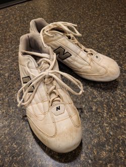 Women size 10? New Balance white softball cleats