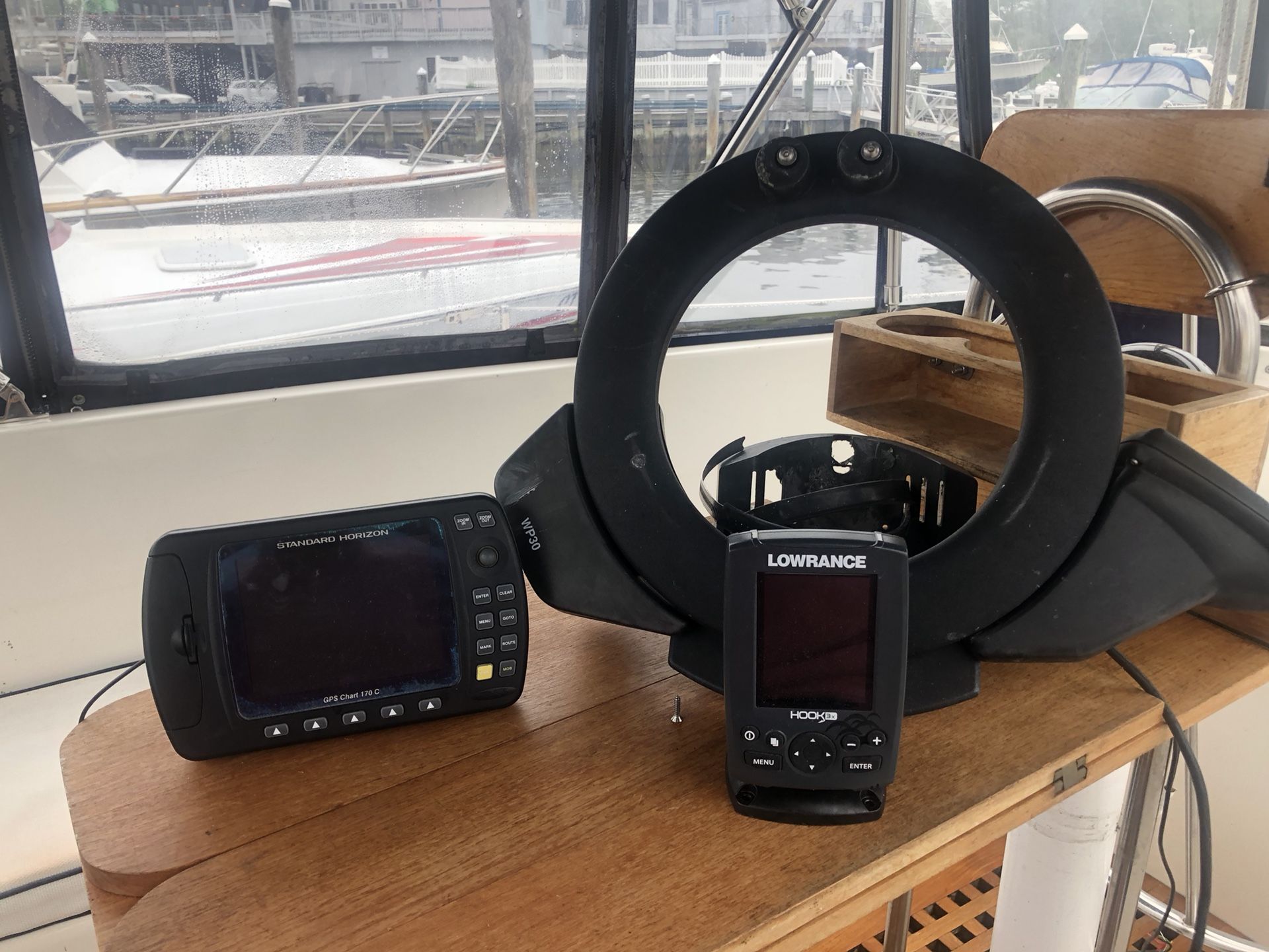 Simrad WP30 wheel pilot, Horizon 170 GPS, lowrance depth finder. All used in working condition.