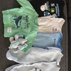 Baby boy clothes and bouncer