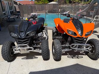 Pair of Kawasaki KFX 700 quads. Fully automatic. Grandparent owned.