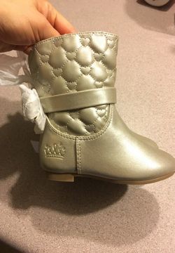 Super Cute silver boots with bow ties on the back