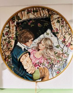 This porcelain collector plate by Kaiser is titled "Sleeping Beauty" and features artwork by Gerda Neubacher