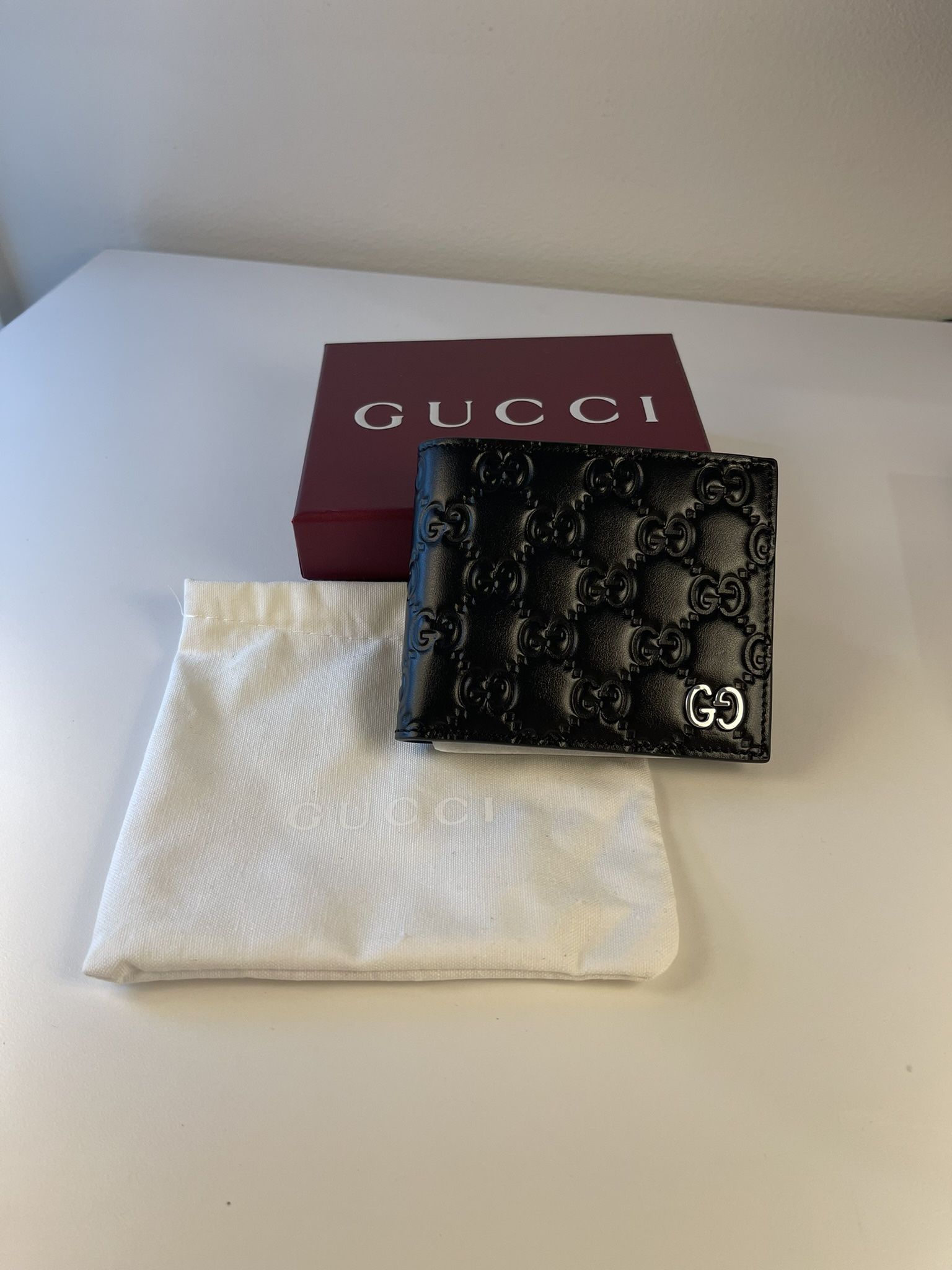 Gucci Emblem bi-fold wallet