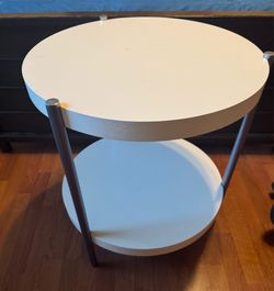 One side beige coffee table-$20- West Kendall