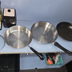 Set Of Three Pans Three Skillets Four Tops And Covers