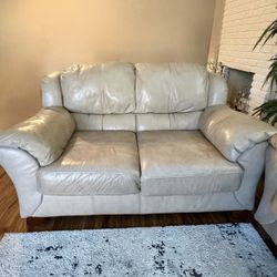 Beige leather loveseat 