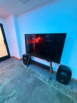Flat Screen 60” TV on Stand
