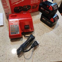 Milwaukee Charger And Two 5 Amp Batteries