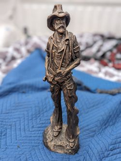SKINNER" COWBOY STATUE