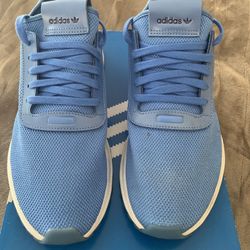 Blue Adidas, women’s size 10