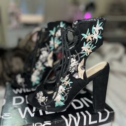 Black suede lace up heels with floral embroidery