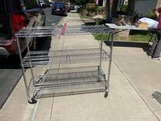Shelf with casters dim48”x18”x42”