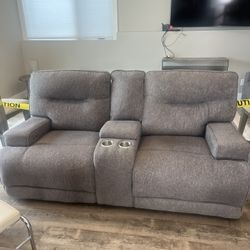 Grey Cloth Reclining Couch From Ashley’s 