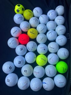 39 used golf balls