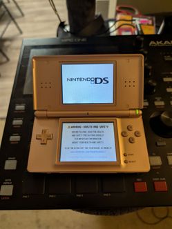 Nintendo DS Lite Rose Gold Pink Handheld Console