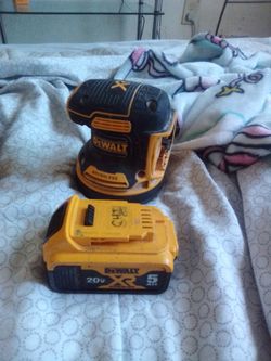 DeWalt XR battery with DeWalt sander