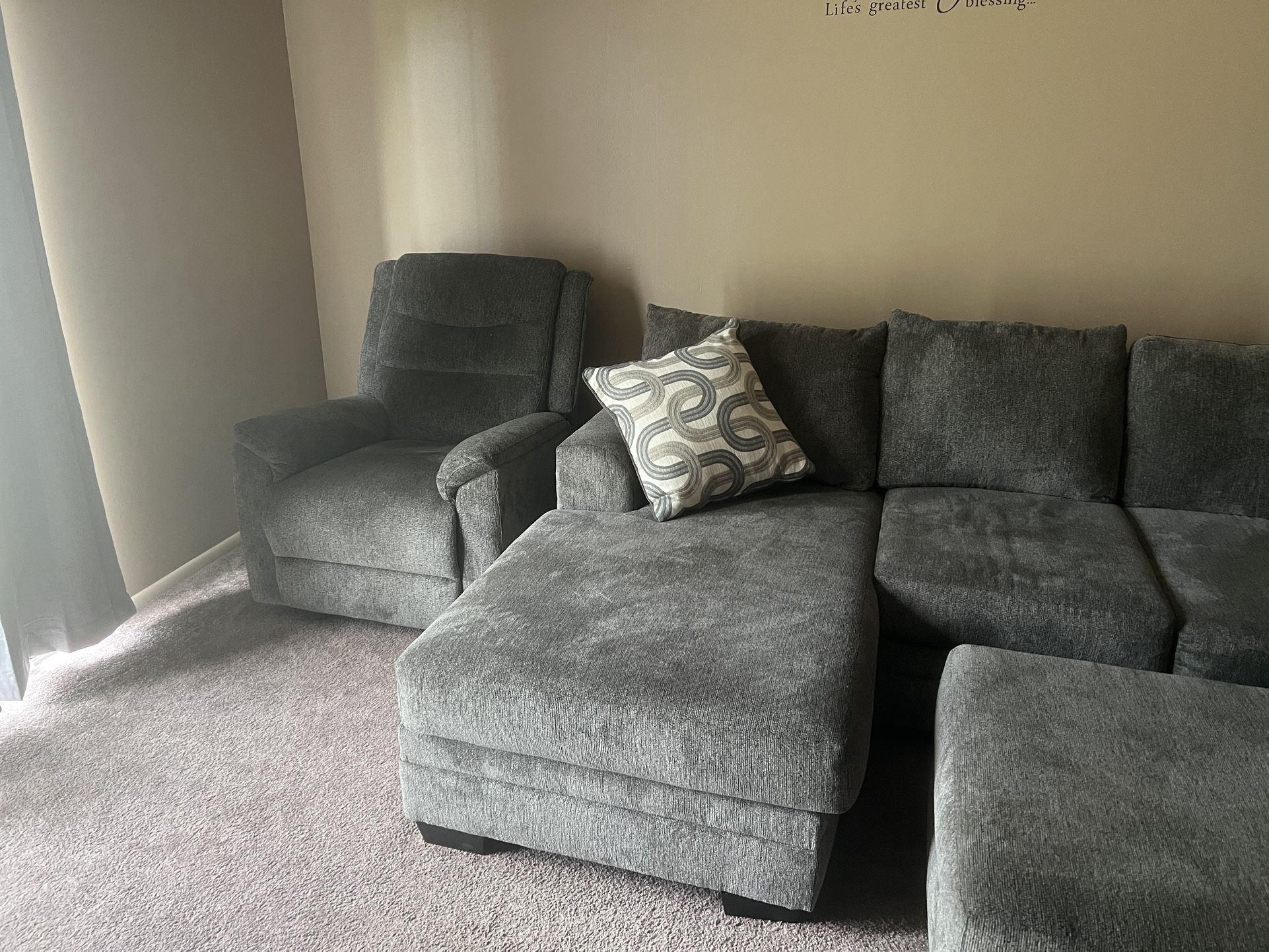 Sectional with Ottoman and and Recliner- Pillows are included.
