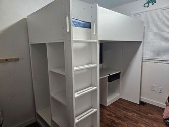 Bunk bed with desk underneath